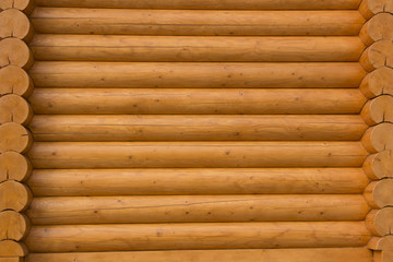 Natural background pattern of a log wall