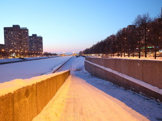 embankment in the winter frosty evening