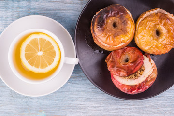 Delicious baked apples with tea and honey