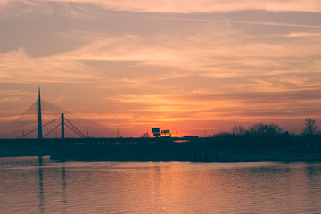 Fototapeta na wymiar Sunset over the river and bridge, Belgrade, Serbia