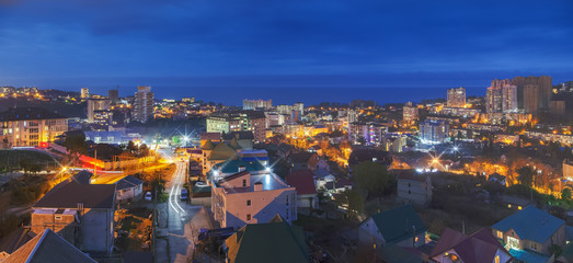 Fototapeta premium Night panorama of the microdistrict Mamaika. Sochi, Russia