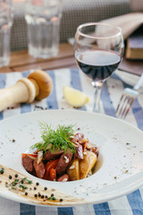 Warm salad with potatoes and grilled sausage