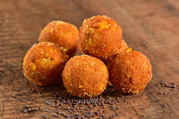 Gulab Jamun on wooden background