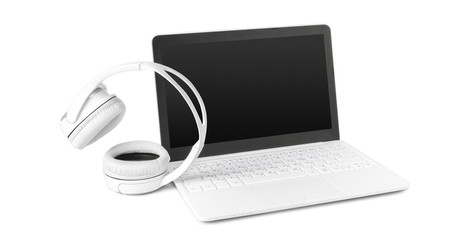 laptop and headphone isolated on white