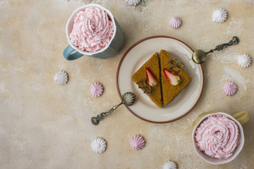 Honey cake with strawberries. Dessert on a plate. Light background with place for your text