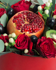 Bouquet of fruit and flowers 