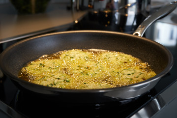 Vegetables frying in a pan