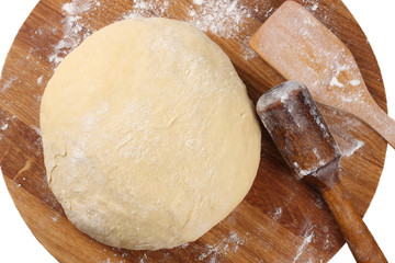white flour on rustic wooden table, top view