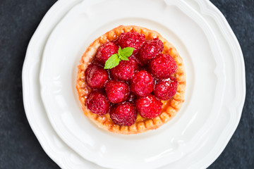Raspberry Tarts with Mint Leaves