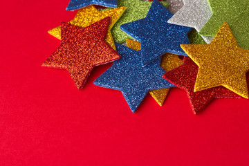 set of glittering stars on red background