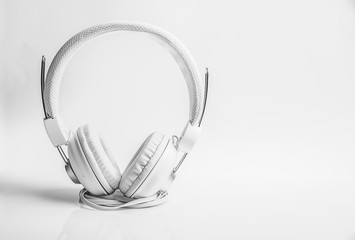 White headphones on white background