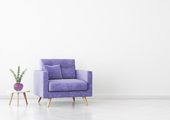 Living room interior with violet velvet armchair, pillow, plant in vase and coffee table on empty white wall background. 3D rendering.