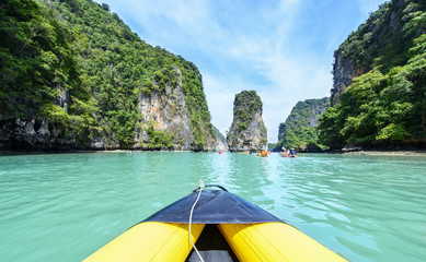 Tourist are visiting by flatwater canoeing. Located in Ao Phang Nga National Park, Phuket, Thailand.