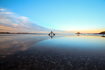 Diving board reflection on sea water swimming pool in Saint Malo, France