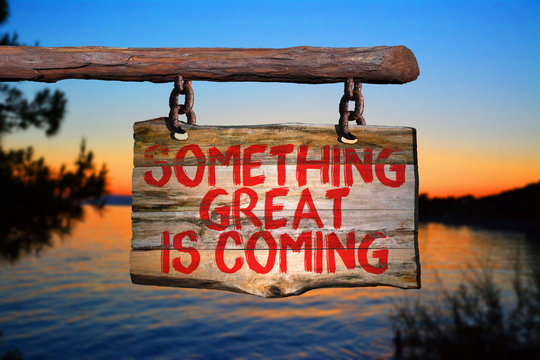 Something great is coming motivational phrase sign