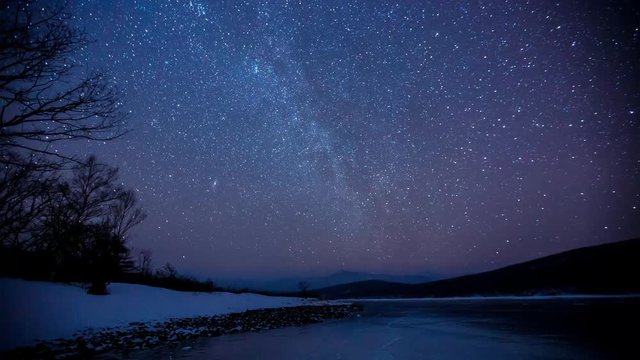 Winter forest timelapse, frosty and pure air, a night sky with millions of stars. Sikhote-Alin Nature Reserve, a biosphere reserve in Russia.