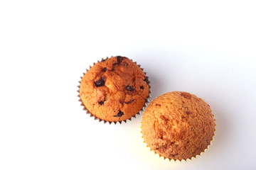 Tasty chocolate cupcakes, muffins on a white wooden table