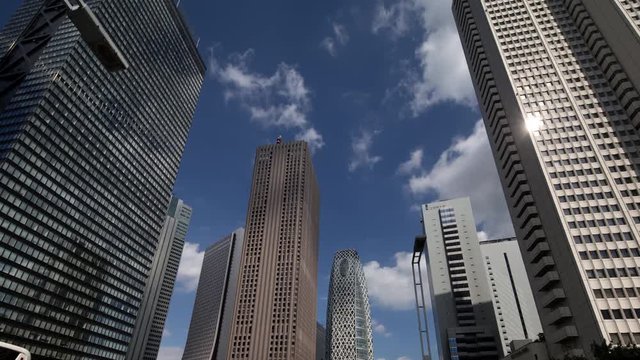 tokyo city timelapse with neon display information and billboards mapped onto each building face