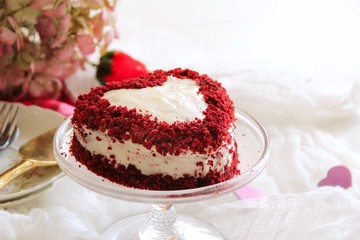Homemade Heart shaped Red Velvet cake / Valentines day food, selective focus