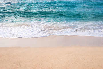 Fototapeta na wymiar beautiful ocean wave on sandy beach of Sunset Beach in Oahu, Hawaii, background