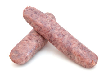 Raw meat sausages isolated on white background