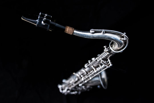 Full view from above of a silver saxophone