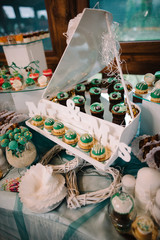 Cake Dessert with macaroons and cake, decorate green tone
