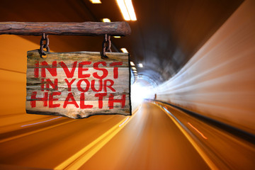 Invest in your health motivational phrase sign
