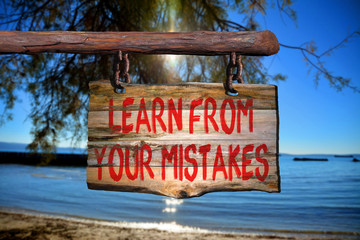 Learn from your mistakes motivational phrase sign