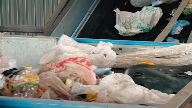 Processing of waste, garbage. Urban landfill. Sorting. Montain garbage. Ecology.