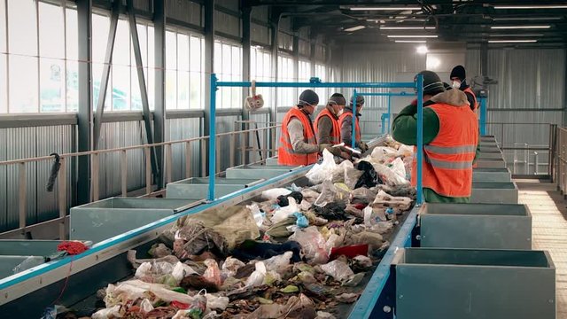 Processing of waste, garbage. Urban landfill. Sorting. Montain garbage. Ecology.