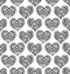 Vector seamless pattern from hand drawn doodle hearts. Black and white texture for Valentine day. Coloring page book for adult. Holiday background