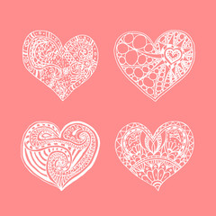 Vector set of four doodle hand drawn white hearts on pink background. Card for Saint Valentines Day. Symbol of love. heart in zentangle style.