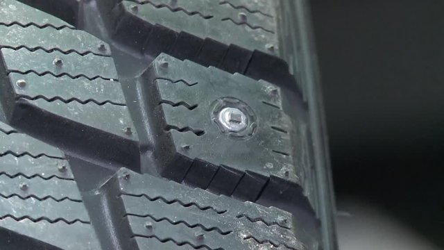 Car tires. Winter wheel. Tread. Spike. Part.