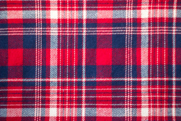 Sample of red tartan textile; Checked fabrics