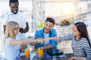 Well done. Attractive blonde wearing glasses and keeping smile on face while sitting in semi position