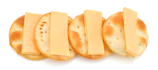 Whole wheat cracker and cheese, isolated on white background, close-up.