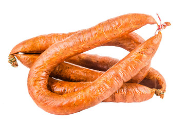 juicy appetizing chicken, pork, beef sausage, salami with spices, with a layer of fat, wrapped in a...