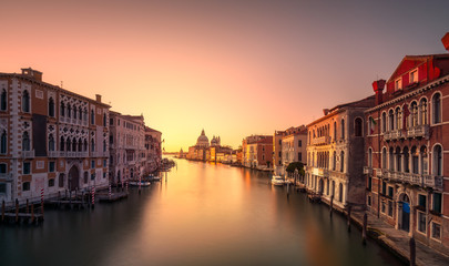 Fototapeta na wymiar Venice grand canal, Santa Maria della Salute church landmark at sunrise. Italy