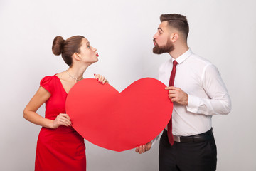 Family celebrate valentine's day, sending each other air kiss