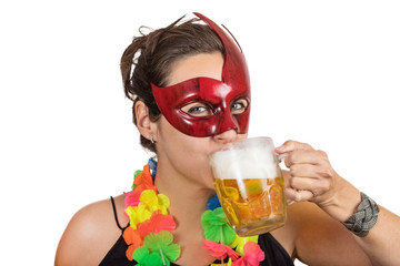 Girl having fun jumping and dancing carnival with mascara necklace of flowers and fan at a party drink beer in white background