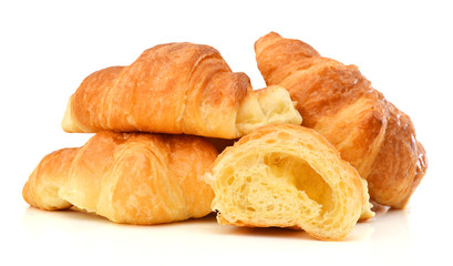 Fresh and tasty croissant over white background