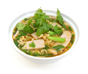 Eating instant noodle bowl and ham on white background