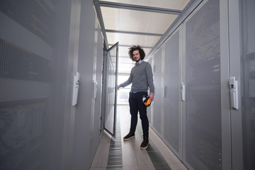 Fototapeta premium technician using digital cable analyzer
