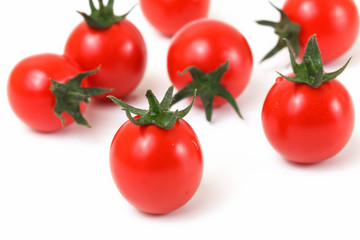 Composition of Ripe Cherry Tomatoes on White Background