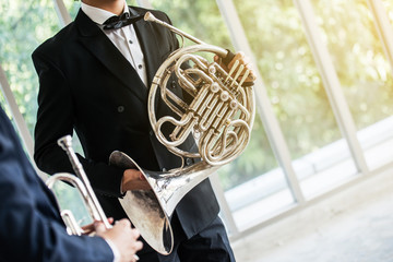 French horn music instrument orchestra classic hornist and player. - obrazy, fototapety, plakaty