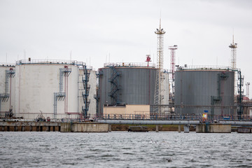 Port grain elevator. Industrial sea trading port bulk cargo zone grain terminal