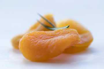 Beautiful and poetic photo of some orangy pretty dried apricot. Close-up macro picture.