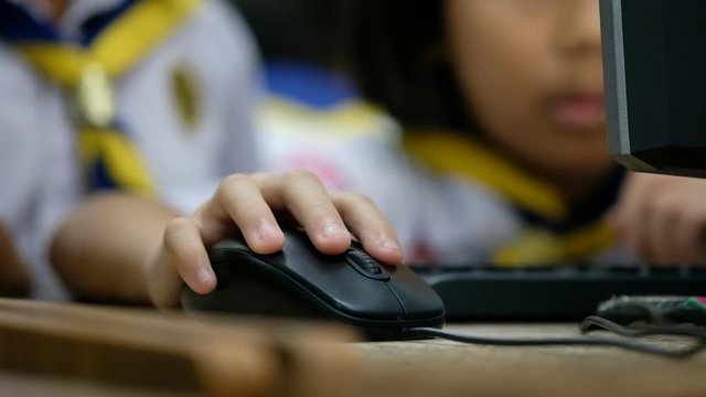 education and school concept, students in computer class