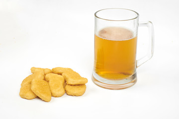 Chicken nuggets and beer isolated on white background